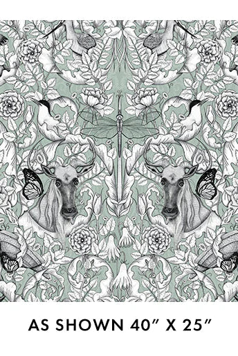Patterned fabric with animals and flowers on a green background, size 40" x 25".