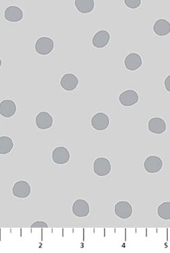 Gray polka dots on a light gray background with a ruler at the bottom.