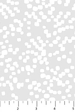 White polka dots on a gray background with a ruler at the bottom.