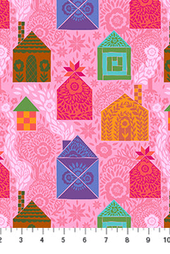 Patterned fabric with colorful houses on a pink background