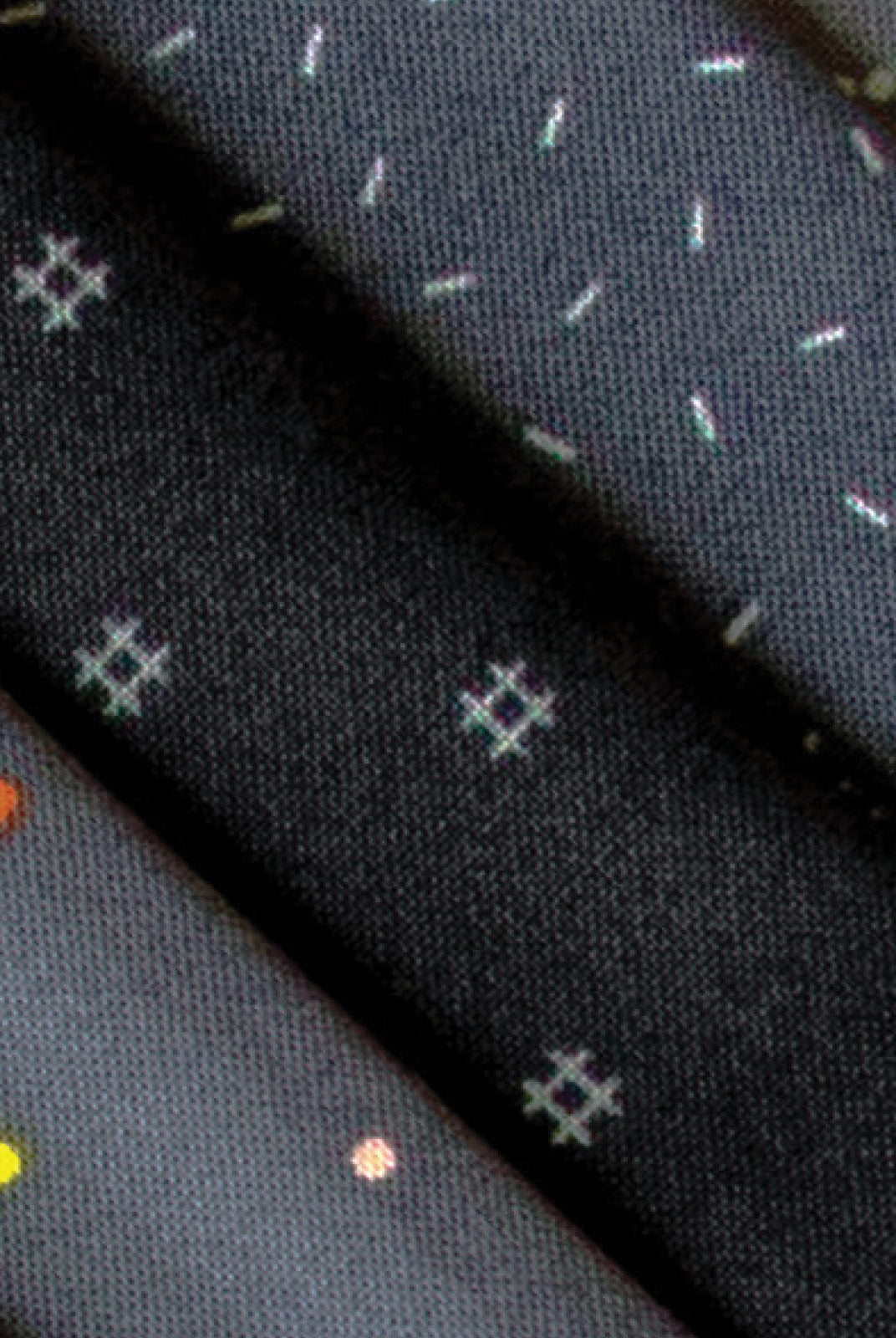 Collection of fabrics with various patterns and colors, featuring the brand 'Dewfall' by Ghazal Razavi. Dewfall 2.5" Microchip Fabric - Figo #MDEDFAL42 - Carmon's Quilt Shop