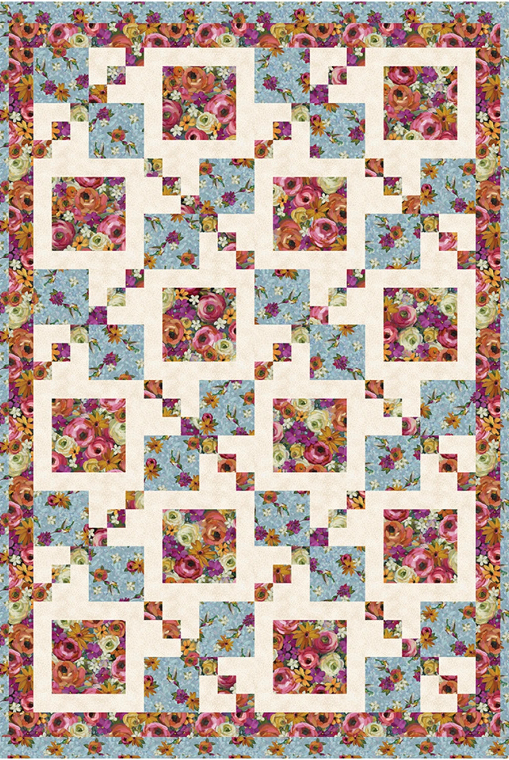 Floral quilt with a geometric pattern on a blue background