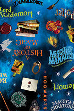 Collage of Harry Potter-themed designs including house crests, characters, and magical items. Harry Potter Blue Words Wide Backing Fabric Benartex Carmon's Quilt Shop