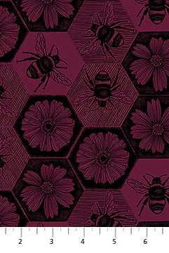 Pattern of bees and flowers on a fabric swatch with a white background.