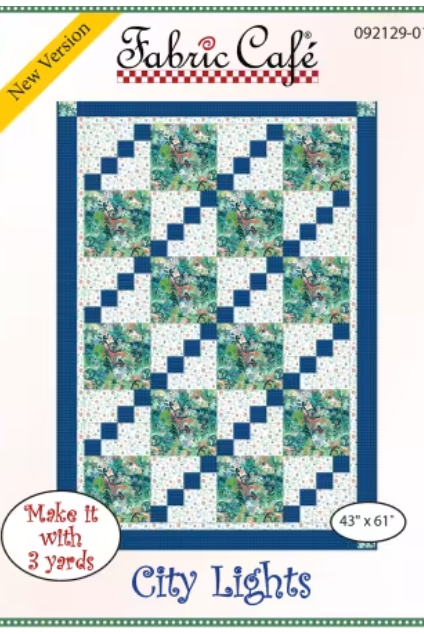 Quilt pattern cover for 'City Lights' by Fabric Cafe with blue and green design.