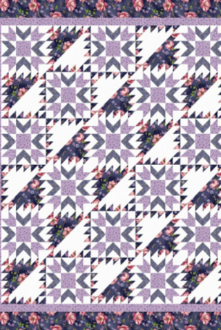 Quilt with geometric pattern on a floral background