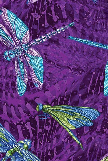 Carmon's Quilt Shop Dragonfly Wonder cotton fabric featuring vibrant blue and green dragonflies on a purple background