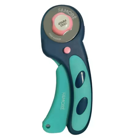 Carmon's Quilt Shop Famore 45mm ergonomic rotary cutter with a teal and dark blue non-slip handle for quilting.