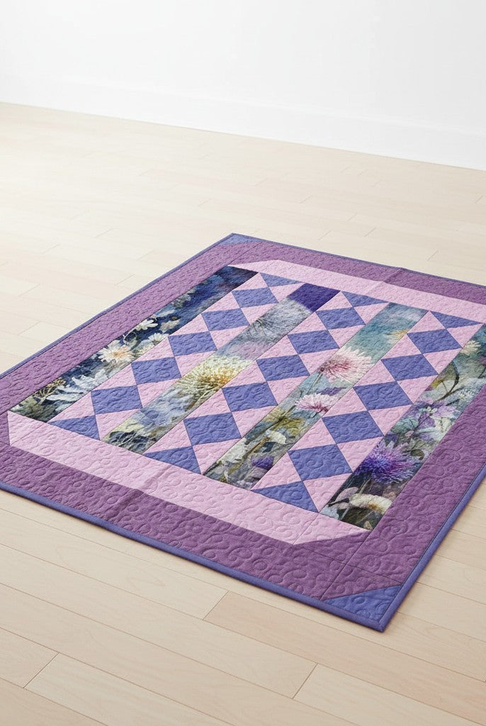 Lovely Flowers Quilt Pattern from Carmon's Quilt Shop featuring floral panels and purple diamond accents.