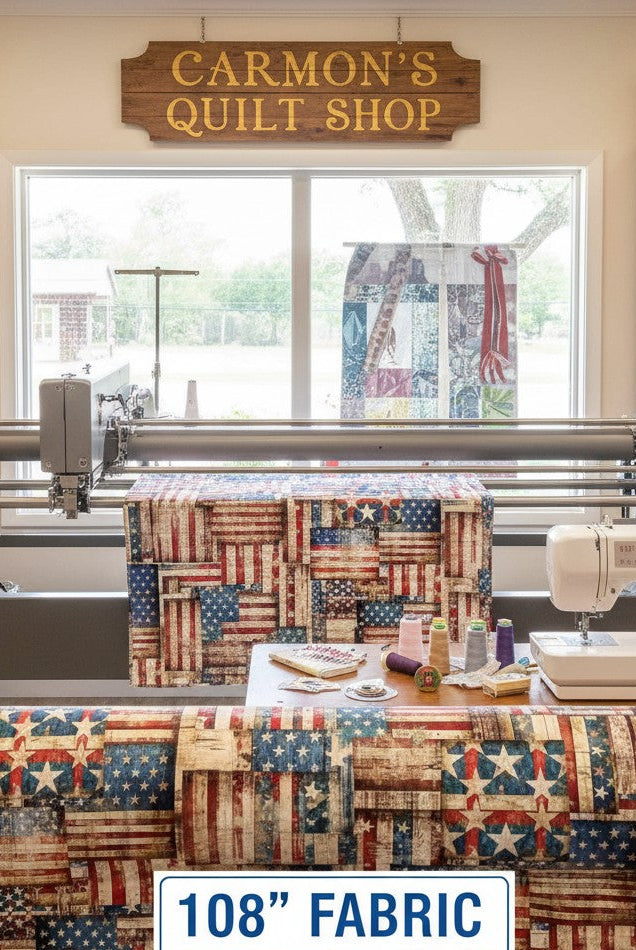 Carmon's Quilt Shop 108 inch wide 1776 flag patchwork cotton fabric by QT Fabrics in a studio setting