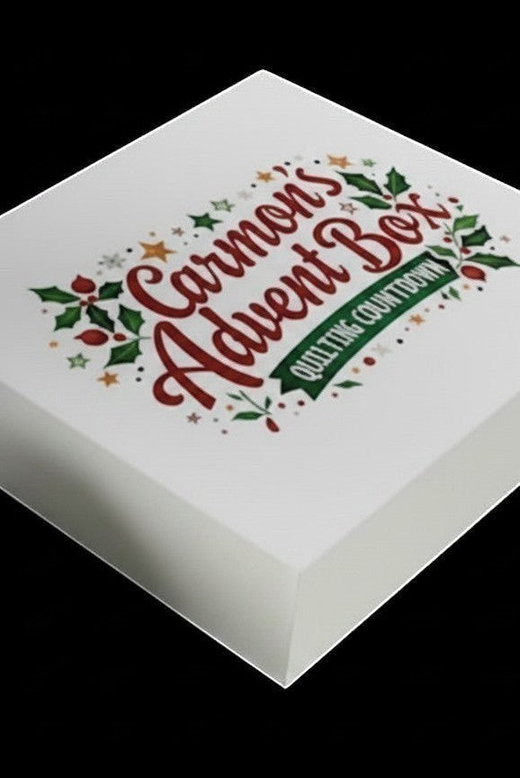 Carmon's Quilt Shop limited-edition holiday advent box with festive branding on a white square gift box