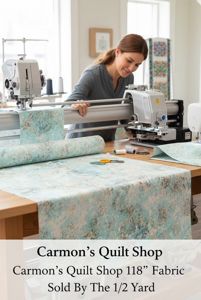 Carmon's Quilt Shop light aqua mottled texture 118 inch cotton quilting fabric on a longarm machine