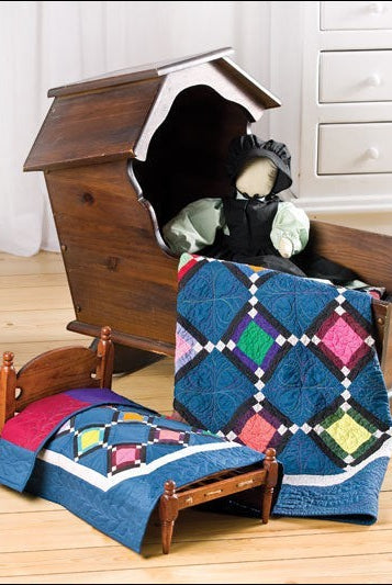 Carmon's Quilt Shop instructional pattern book featuring colorful scrappy baby quilt designs and heirloom projects.