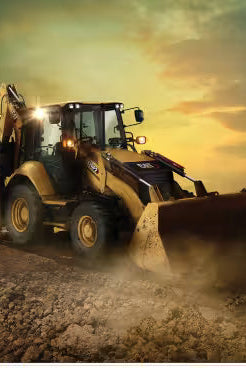 Carmon's Quilt Shop backhoe loader construction quilt kit featuring Riley Blake panel and Northcott Stonehenge fabric