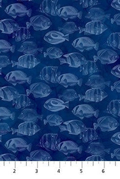 Carmon's Quilt Shop fabric featuring a deep blue underwater pattern with schools of fish for quilting projects.