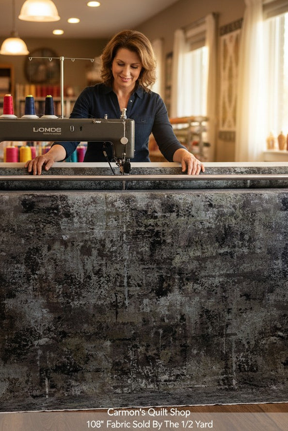Carmon's Quilt Shop QT Fabrics charcoal mottled 108-inch wide cotton quilting fabric on a long-arm sewing machine