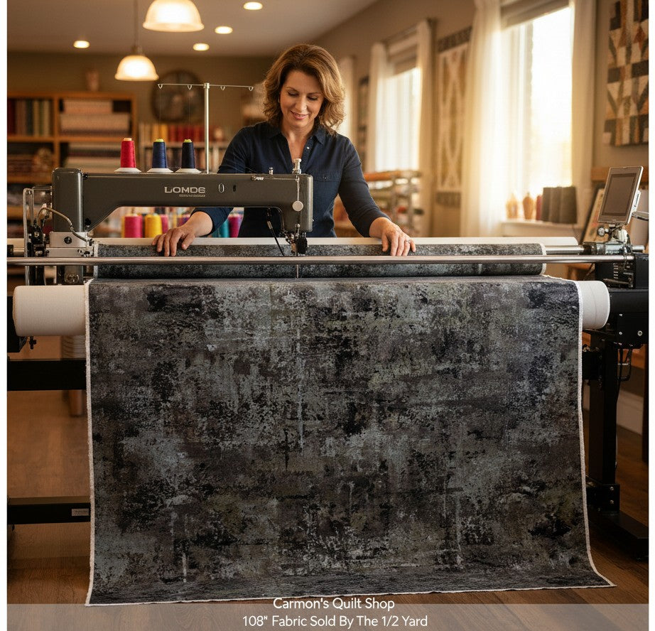 Carmon's Quilt Shop QT Fabrics charcoal mottled 108-inch wide cotton quilting fabric on a long-arm sewing machine