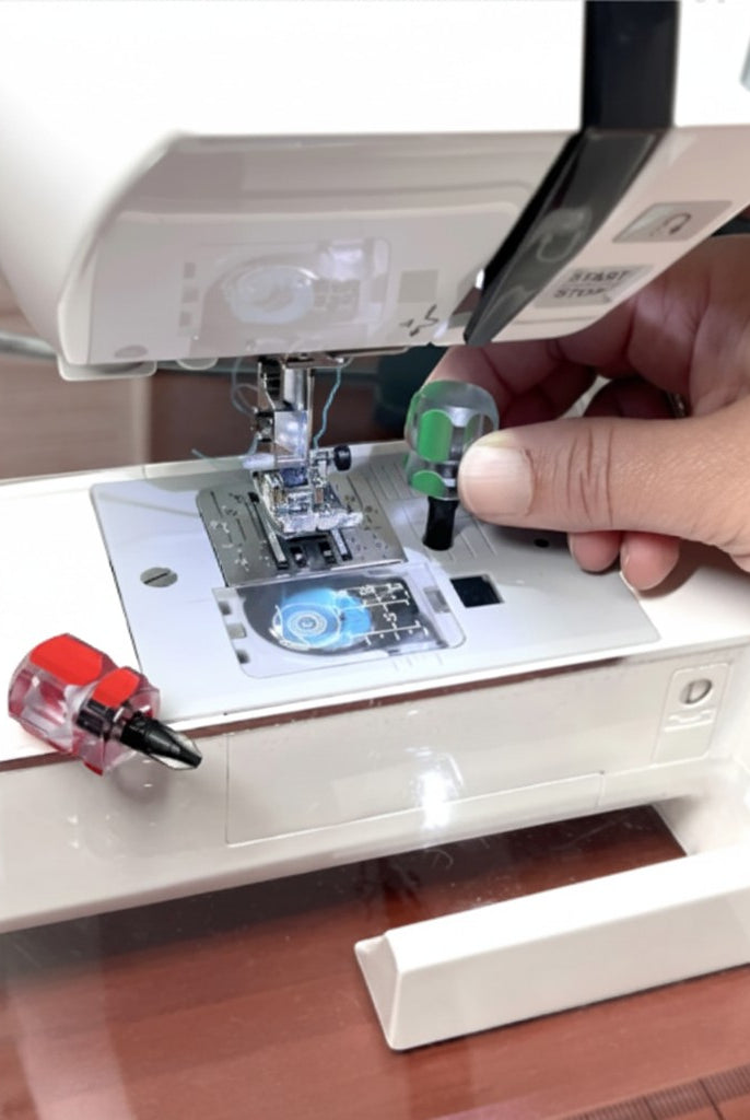 Carmon's Quilt Shop compact screwdriver set being used on a sewing machine needle plate for maintenance