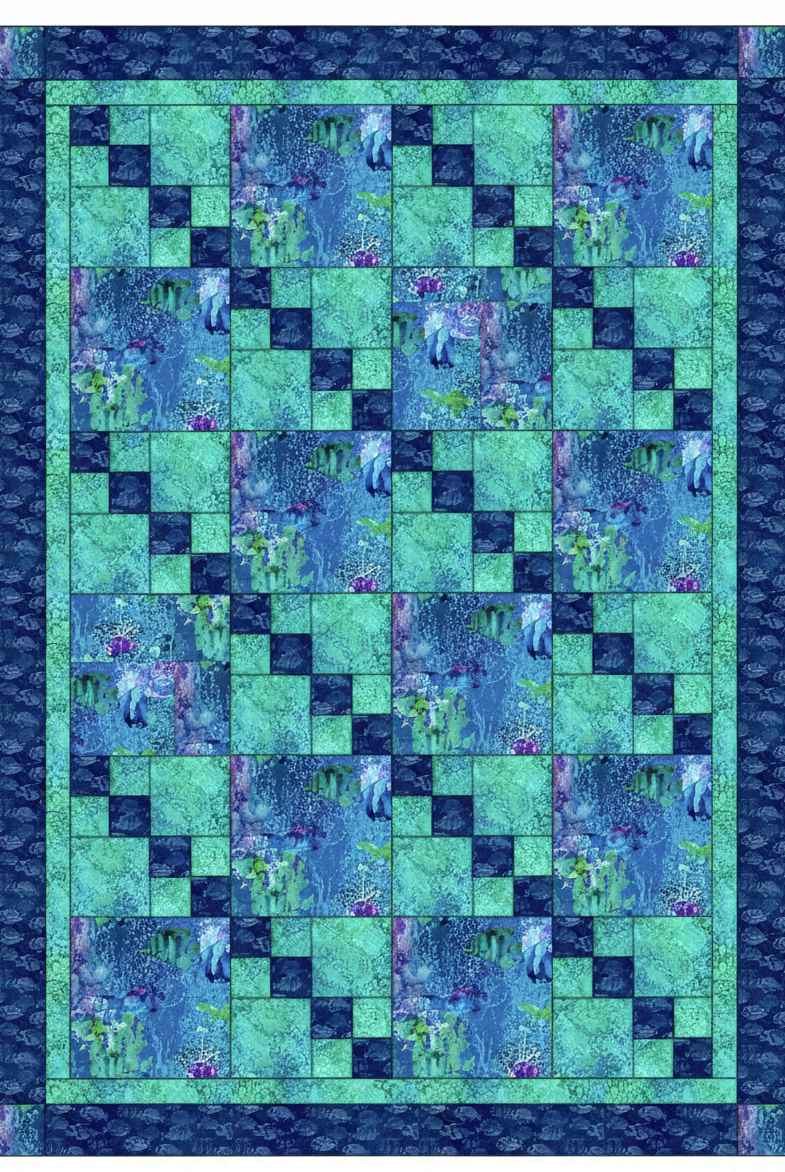 Carmon's Quilt Shop Coral Reef quilt kit featuring blue and aqua sea turtle and fish fabric in a patchwork design.