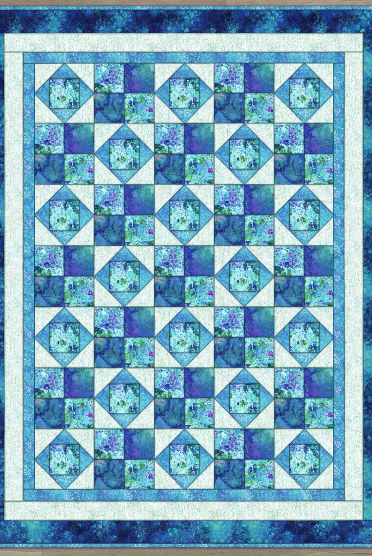 Carmon's Quilt Shop Coral Sea Span quilt kit featuring a geometric blue and white cotton pattern for baby quilts.