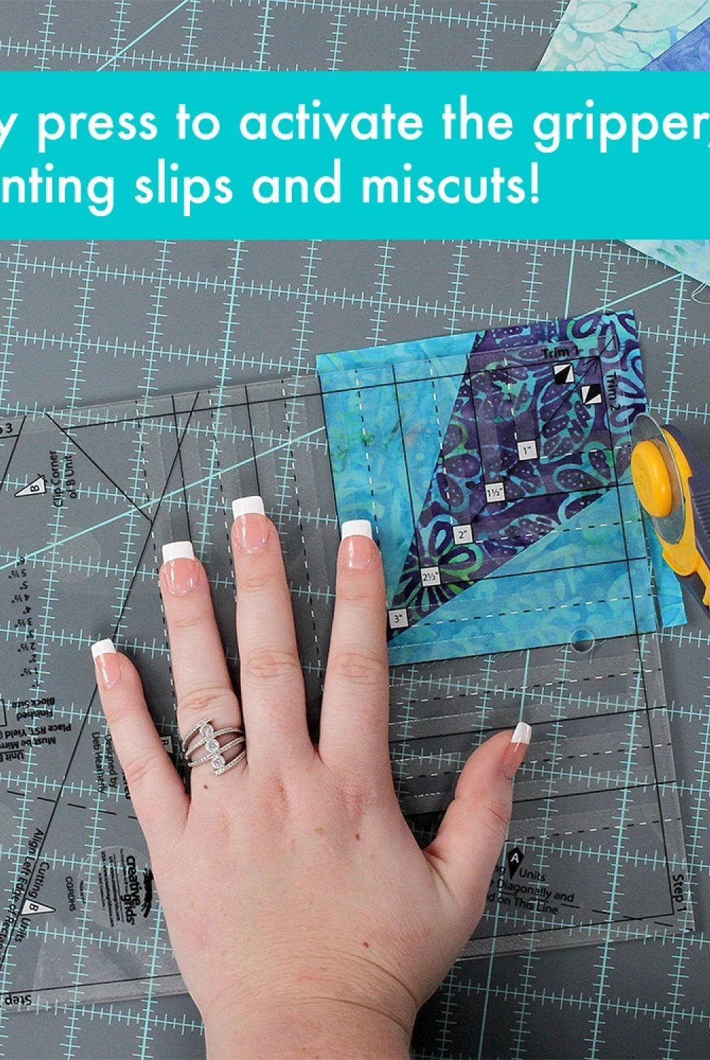 Carmon's Quilt Shop Creative Grids Kitty Cornered quilting ruler, 11" x 11", with clear acrylic and black markings for precise cuts.