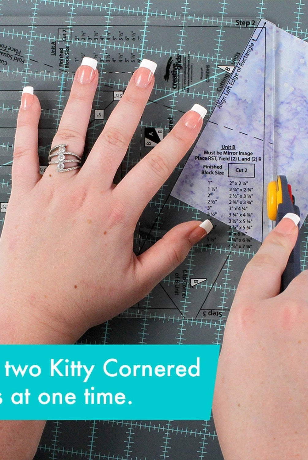 Carmon's Quilt Shop Creative Grids Kitty Cornered quilt ruler for making blocks two at a time. Clear acrylic with black markings.