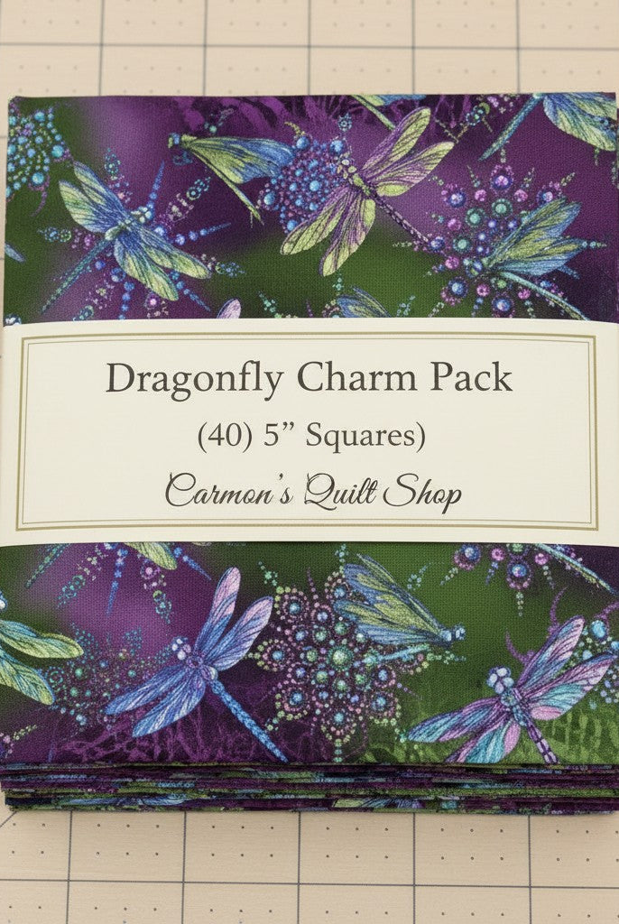 Carmon's Quilt Shop Dragonfly Wonder 5-inch charm pack featuring 40 cotton fabric squares with dragonfly prints.