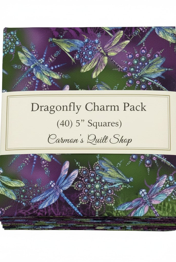 Carmon's Quilt Shop Dragonfly Wonder charm pack with 40 purple and green 5-inch cotton quilting fabric squares.