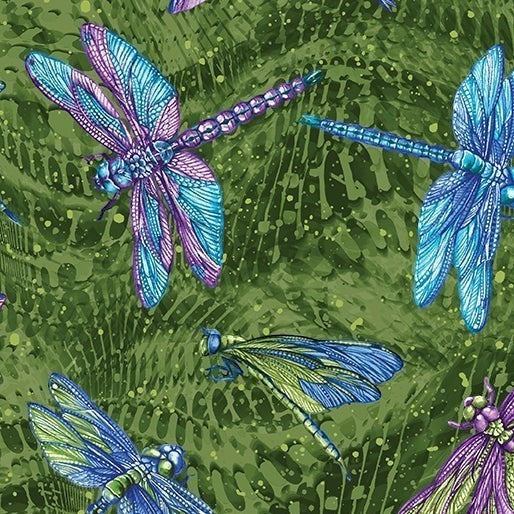Carmon's Quilt Shop Dragonfly Wonder cotton fabric featuring vibrant blue and purple dragonflies on a green background