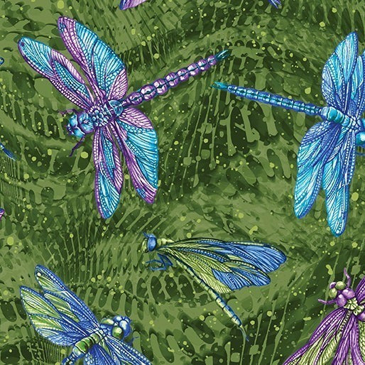 Carmon's Quilt Shop Dragonfly Wonder cotton fabric featuring vibrant blue and purple dragonflies on a green background.