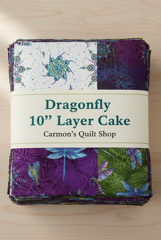 Carmon's Quilt Shop Dragonfly Wonder 10-inch layer cake featuring 40 cotton fabric squares with dragonfly prints.