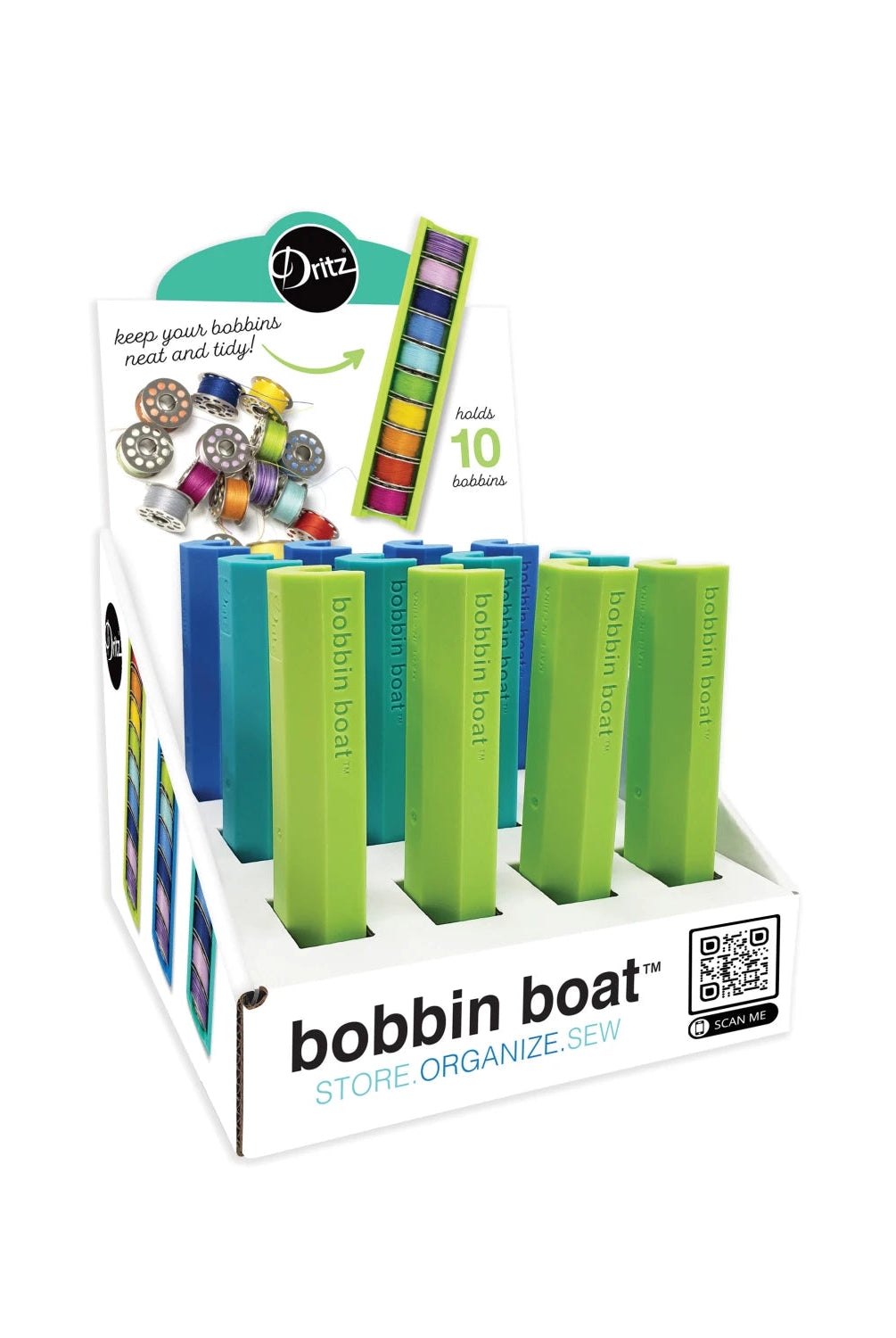 Carmon's Quilt Shop Dritz Bobbin Boat display box filled with green and blue plastic bobbin storage holders