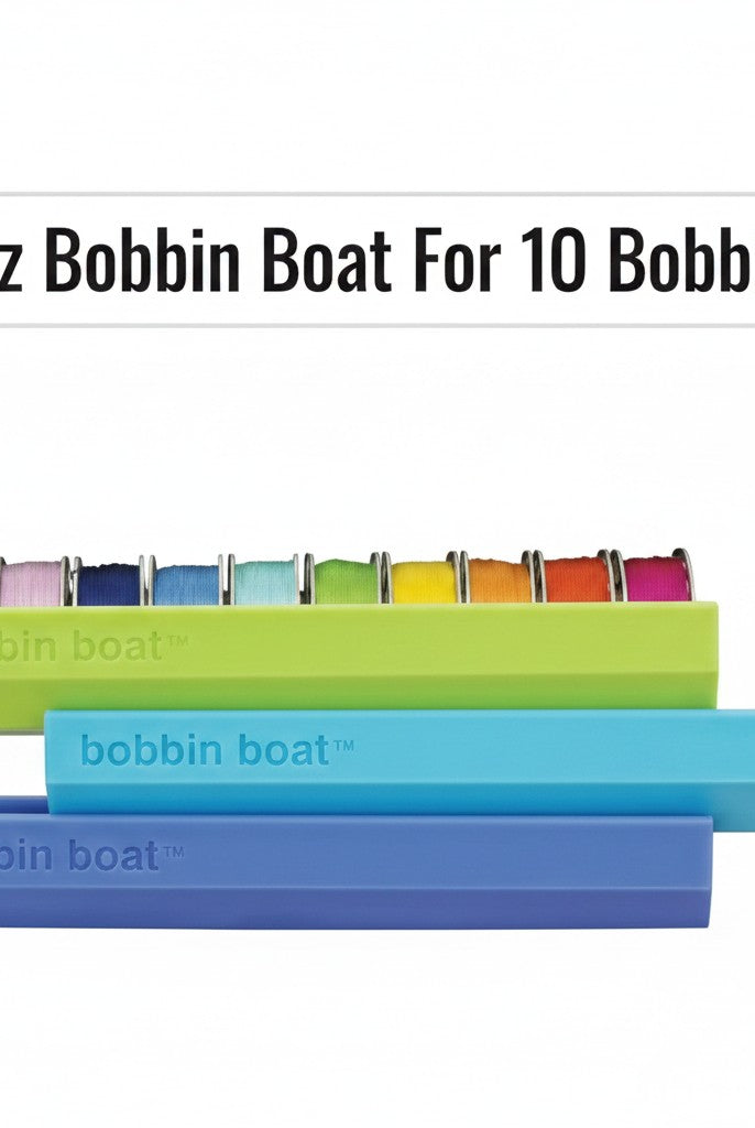 Carmon's Quilt Shop Dritz Bobbin Boat organizers in green, blue, and purple holding ten colorful sewing bobbins.