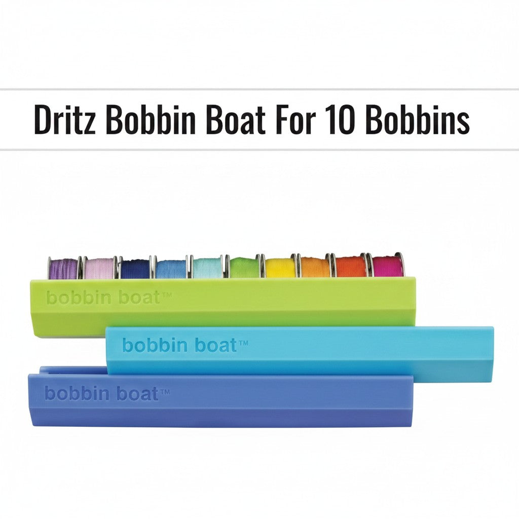 Carmon's Quilt Shop Dritz Bobbin Boat organizers in green, blue, and purple holding ten colorful sewing bobbins.