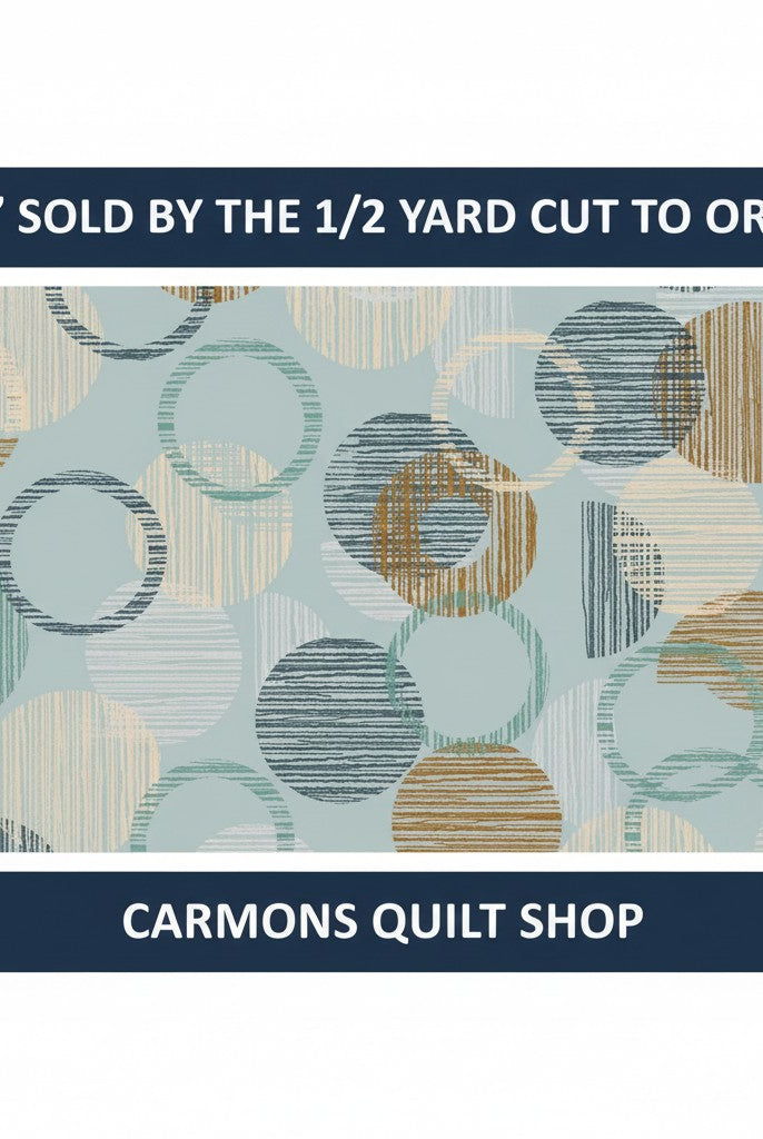 Carmon's Quilt Shop 118 inch wide cotton backing fabric featuring a dusty aqua overlapping circle geometric pattern.