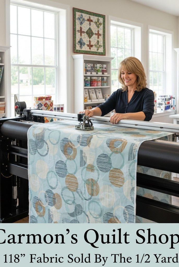 Carmon's Quilt Shop dusty aqua cotton fabric with overlapping circle geo print on a longarm quilting machine