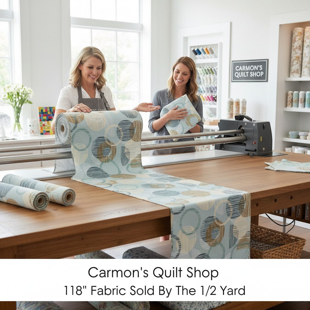 Carmon's Quilt Shop dusty aqua cotton fabric with overlapping circle geometric print on a longarm quilting machine