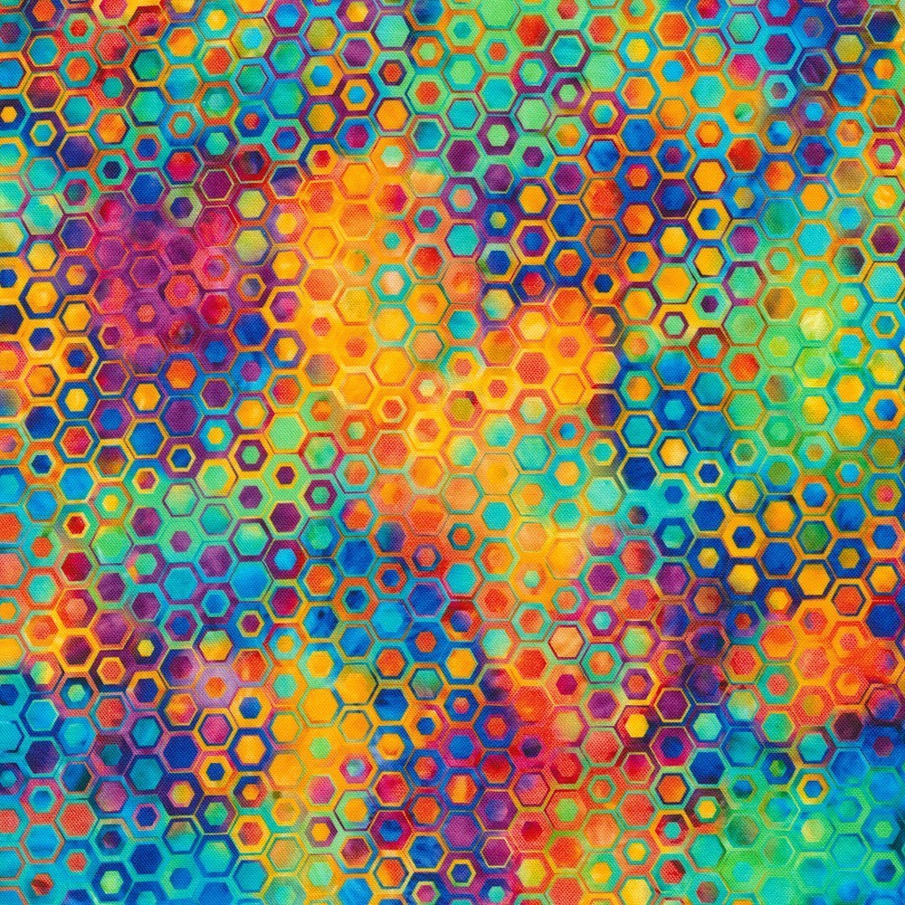 Carmon's Quilt Shop Fiesta Phantasma 108-inch cotton fabric with a vibrant, colorful hexagon and starburst pattern.