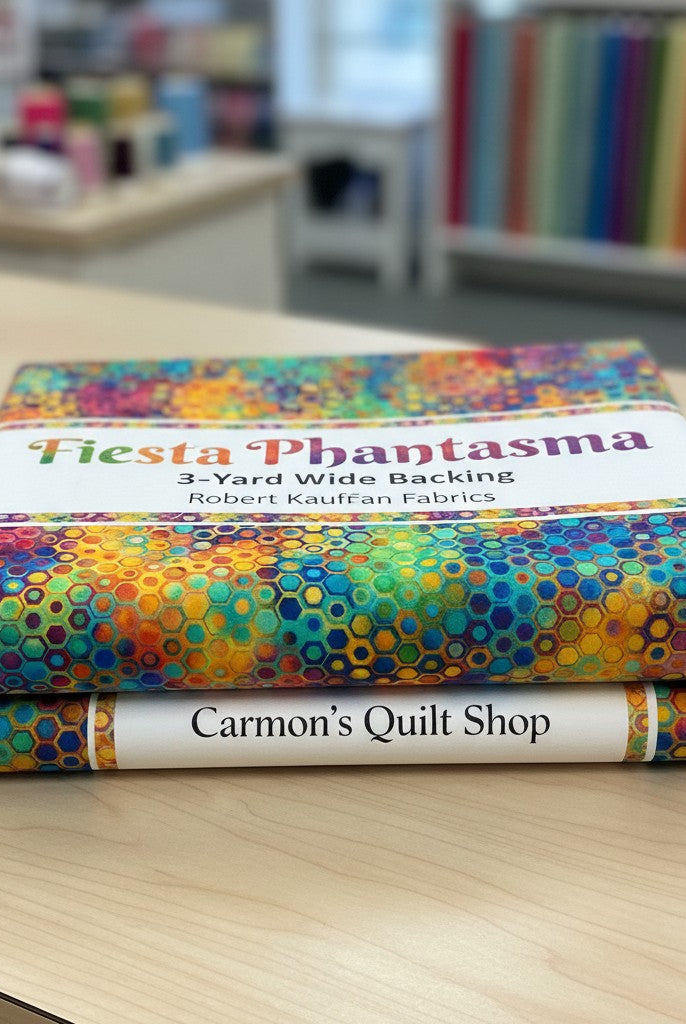 Carmon's Quilt Shop Fiesta Phantasma 108-inch wide cotton quilt backing with a colorful hexagon starburst pattern.
