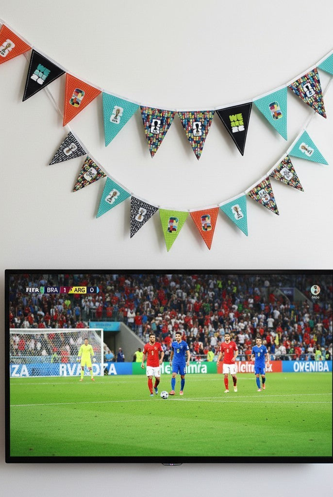 Carmon's Quilt Shop FIFA World Cup 2026 bunting kit with colorful pennants featuring football graphics and patterns.