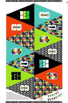 Carmon's Quilt Shop FIFA World Cup fabric panel with geometric pennants in orange, green, black, and blue with FIFA logos.