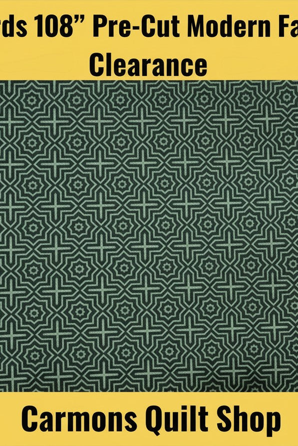 Carmon's Quilt Shop modern green 100% cotton quilt backing fabric with a geometric star pattern in a 3-yard cut.