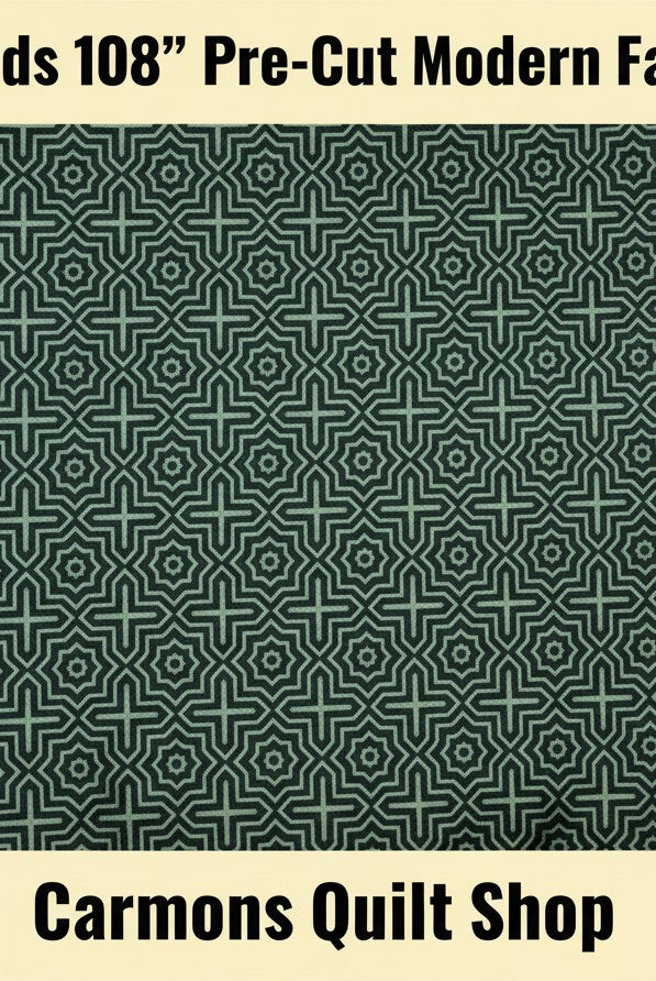 Carmon's Quilt Shop green 100% cotton modern wide backing fabric with geometric star and cross pattern