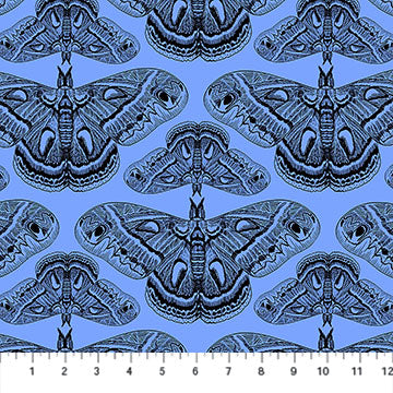 Carmon's Quilt Shop Indelible Ink cotton fabric featuring detailed black moth illustrations on a light blue background