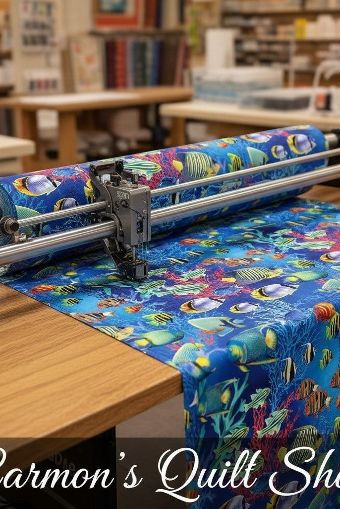 Carmon's Quilt Shop Jewel of the Sea cotton fabric with colorful tropical fish and coral reef print on a quilting machine
