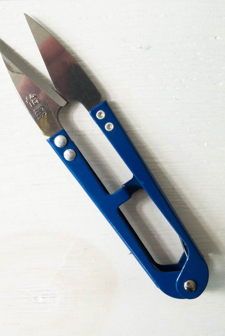 LDH Scissors thread snips XL from Carmon's Quilt Shop with sharp metal blades and a blue handle for precision sewing.
