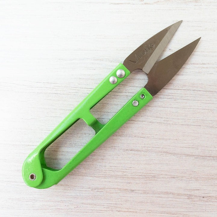Carmon's Quilt Shop LDH Thread Snips XL with bright green handles and sharp metal blades for precision sewing tasks.