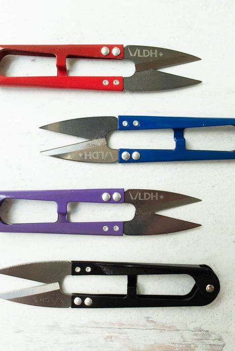 Carmon's Quilt Shop LDH Thread Snips XL in red, blue, purple, and black for precision sewing and quilting.