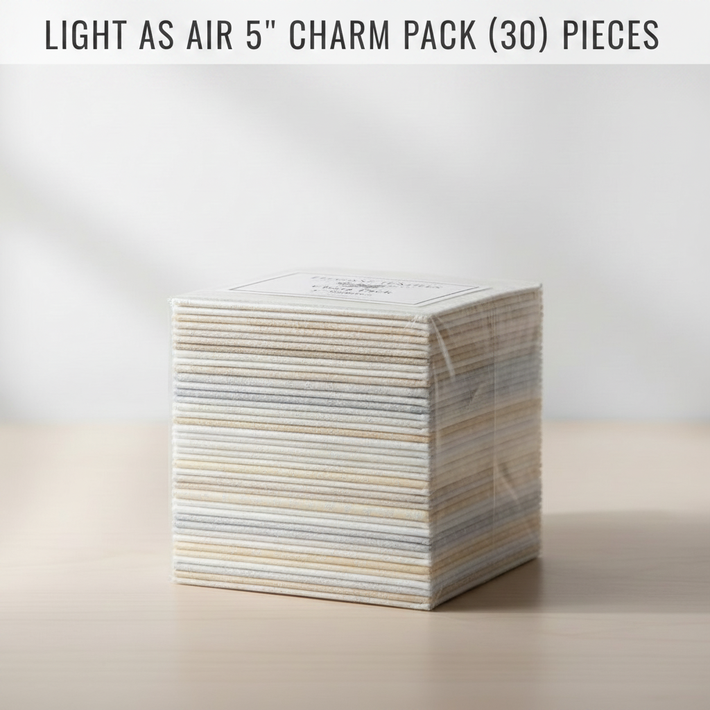 Carmon's Quilt Shop Light As Air 5-inch charm pack featuring a stack of 100% cotton floral quilting fabric squares.