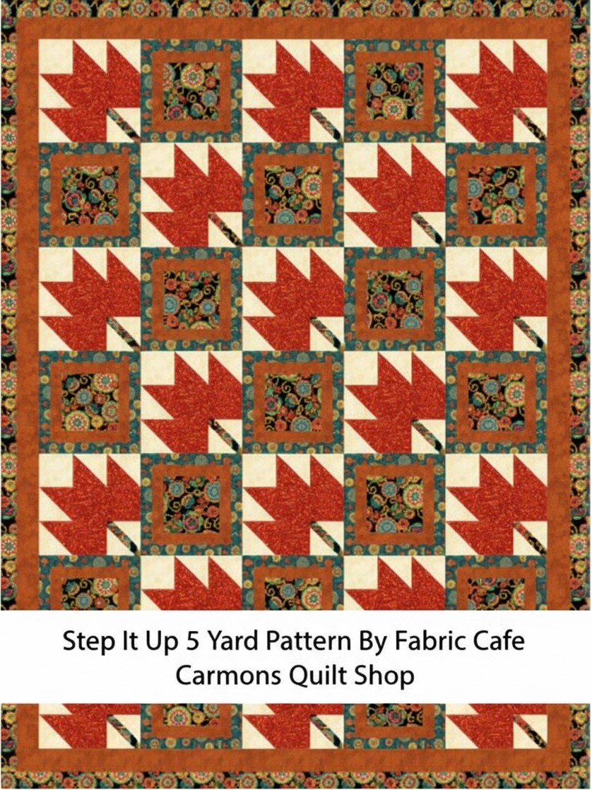 Carmon's Quilt Shop 5-yard quilt featuring a red maple leaf pattern with floral blocks and a rust-colored border.